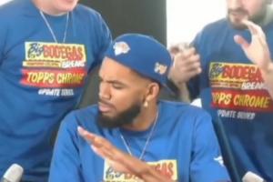 手下败将罢了！唐斯抽到文班签名卡毫无波澜 压手示意周围人安静